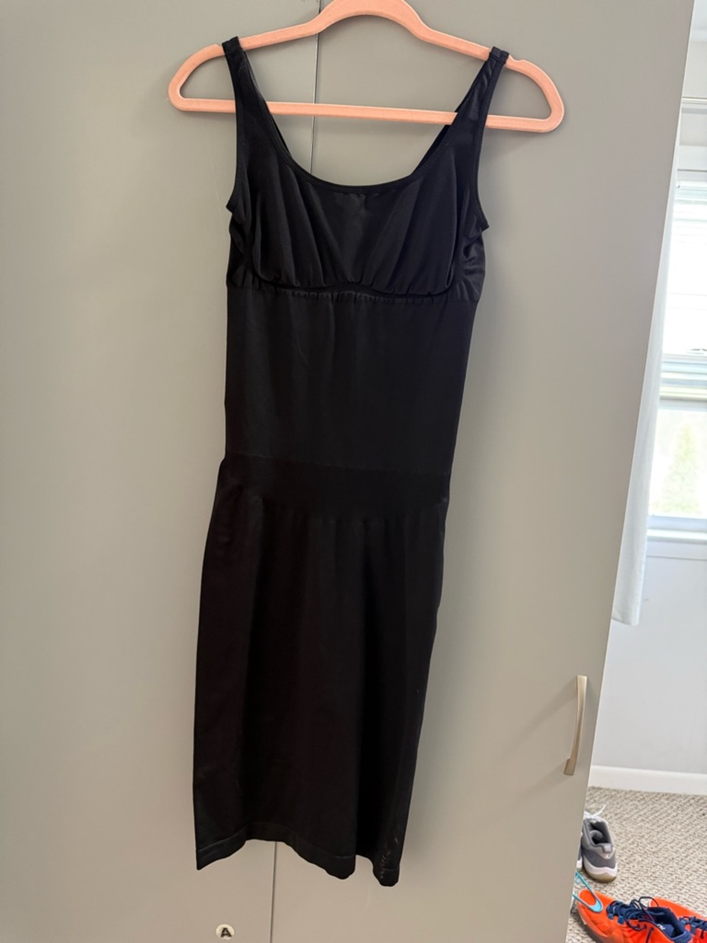 Classic Black Sleeveless Midi Dress – Timeless Silhouette